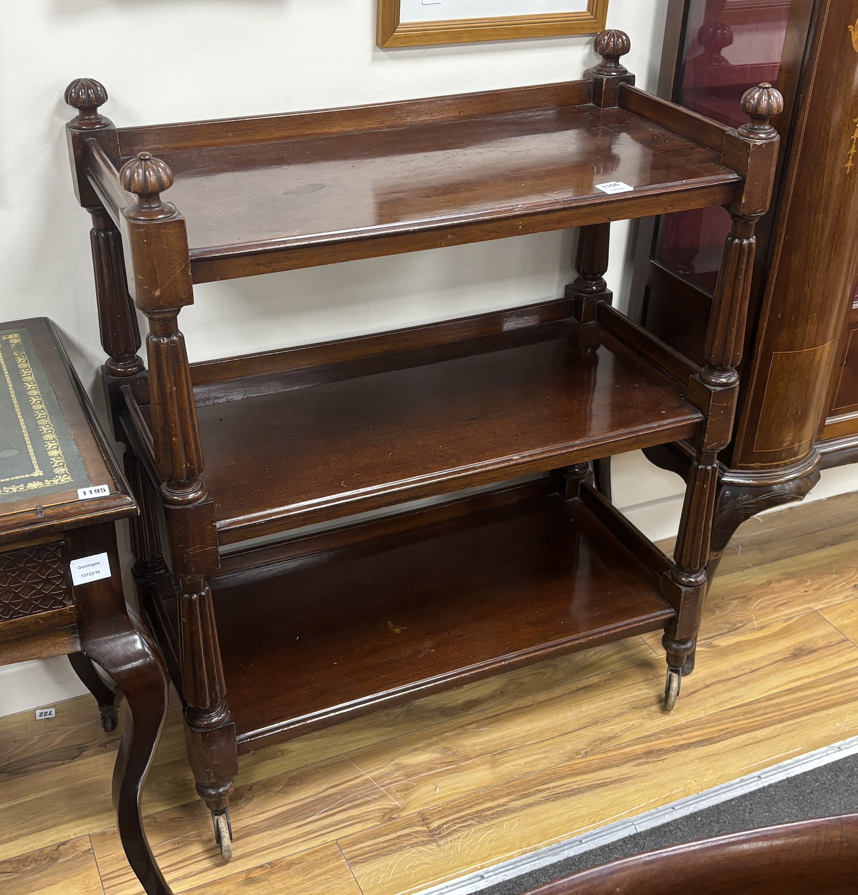 A Victorian mahogany three tier buffet, width 86cm, depth 43cm, height 105cm